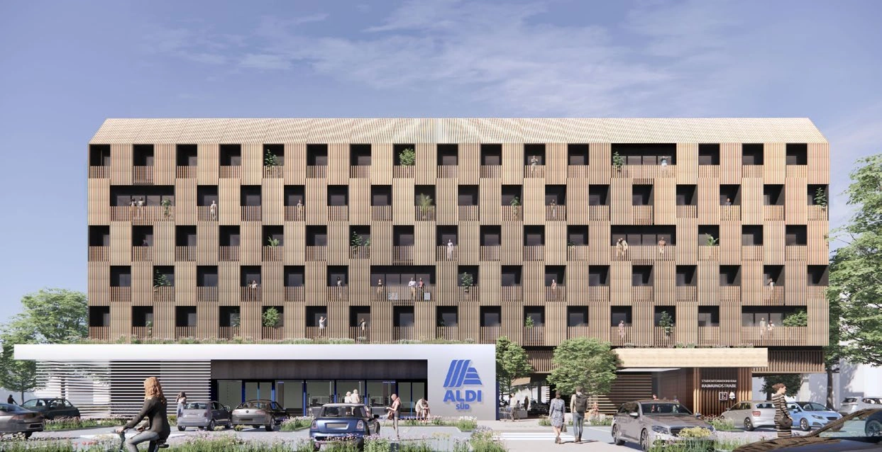Timber-clad modular housing above the retained ALDI supermarket and public street frontage.